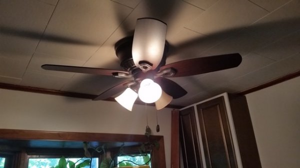 kitchen fan light installed and lit.jpg