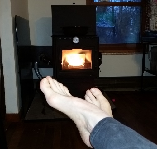 Feet in front of pellet stove.jpg