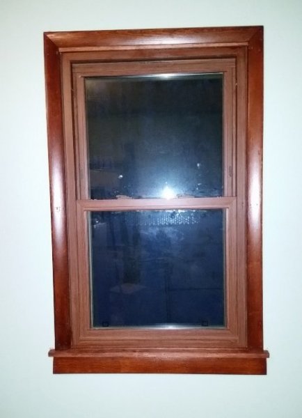 craft room back window trim.jpg