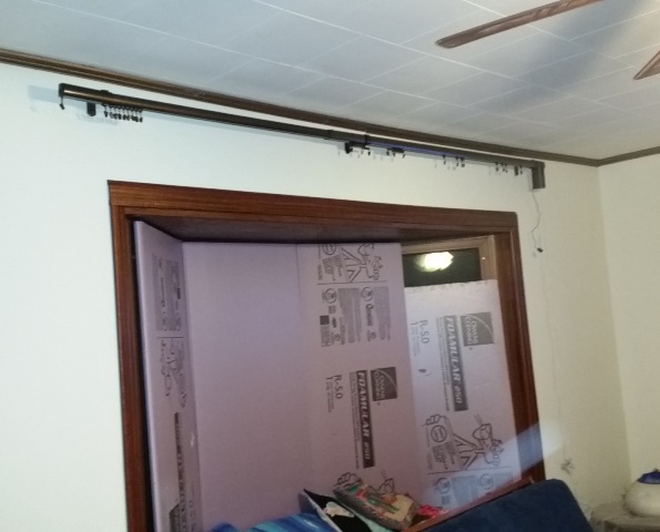 living room curtain traverse rod.jpg