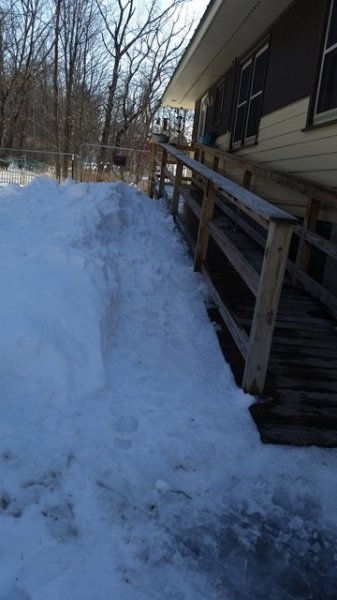 Shoveled snow along ramp 2-18-17.jpg