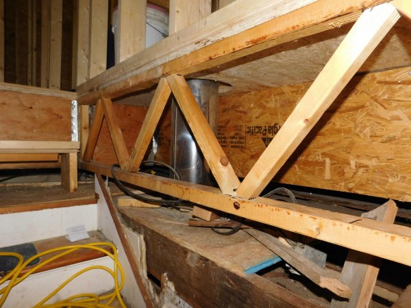original floor- new trusses- sub-floor.JPG
