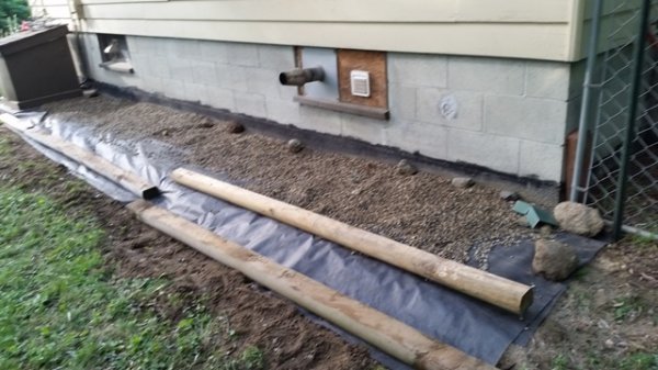 Pea gravel under stove pipes.jpg
