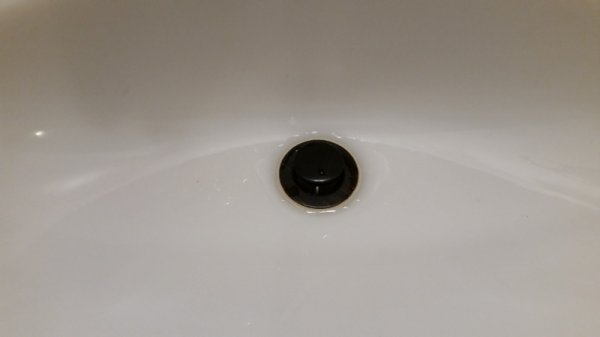 vanity drain attached and tested.jpg
