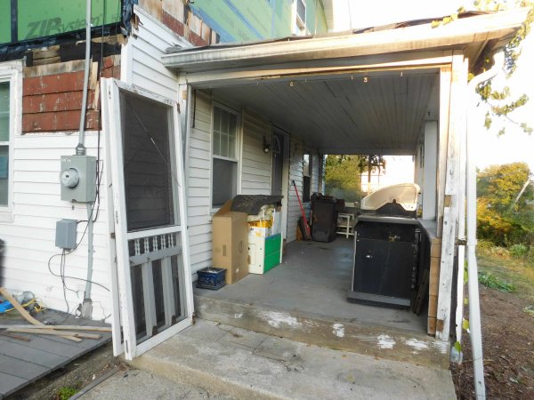 Porch entrance- old tired porch from the 1940's.JPG