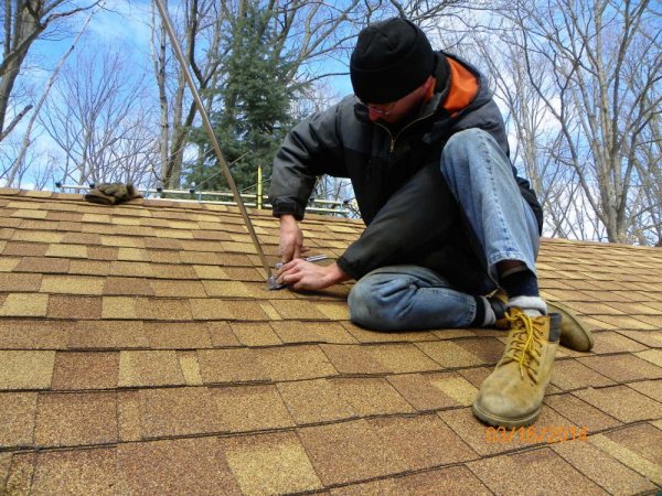 Pete installing chimney brace.JPG