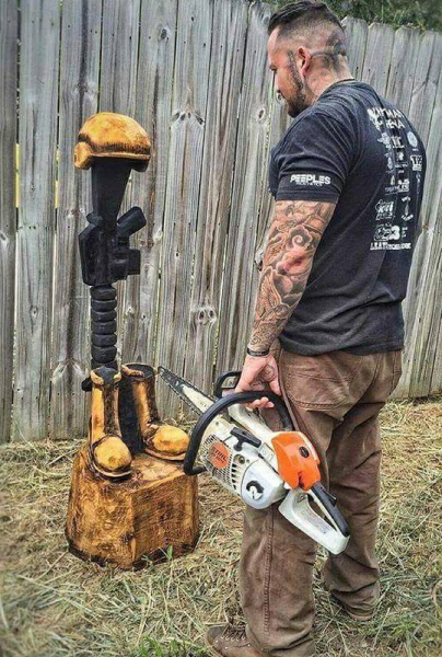 fallen soilder wood carving.png