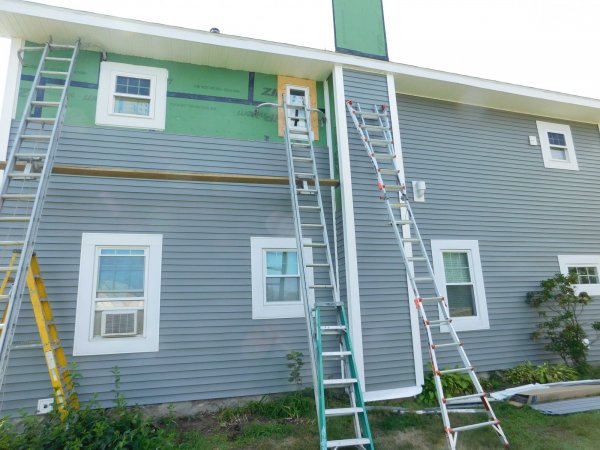 31 July 2018 East side siding and trim.JPG