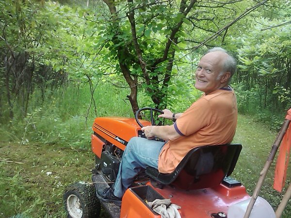 2010-06-27 15.05.10Dad and his Ariens picking berries.jpg