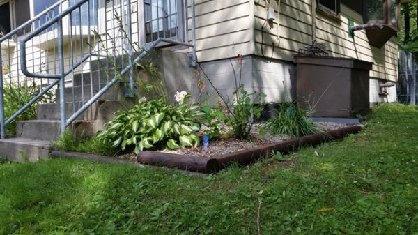 restained timbers door flower bed.jpg