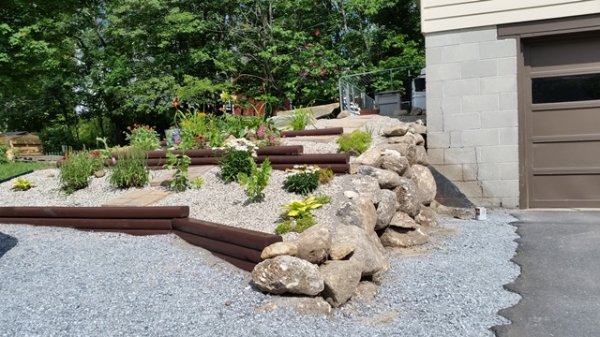 Stained timbers new flower bed.jpg