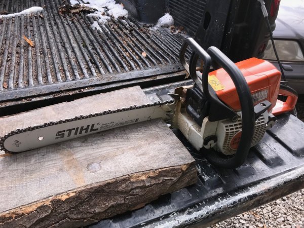 MS250 in sharpening block.jpg