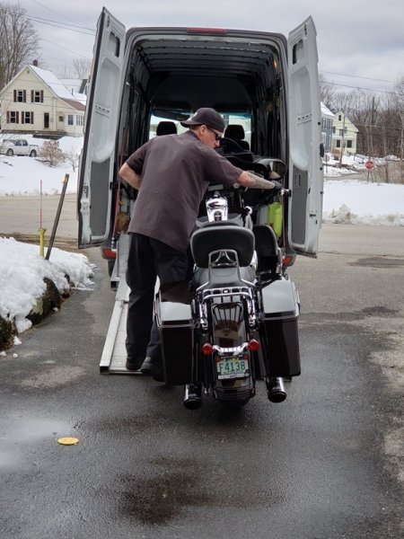 Bike being backed out of van.jpg