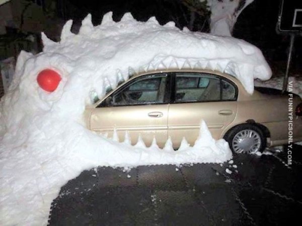 Decorating car with snow.jpg