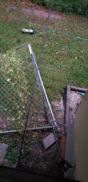 Fence panel leaning.jpg