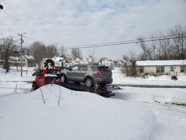 Truck on tow truck.jpg