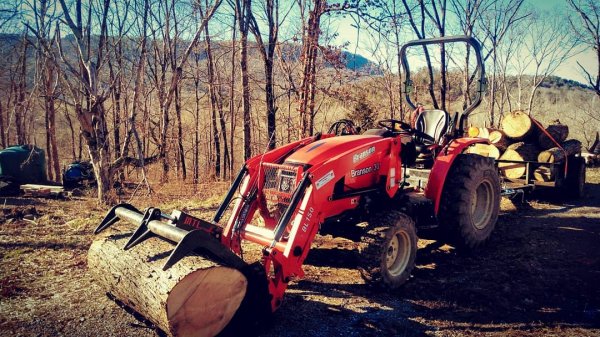 tractor and wood.jpeg