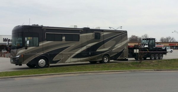 bus dump trailer charity cut MO.jpg