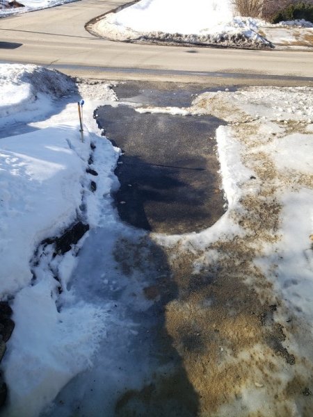 ice on driveway 2-12 2-15pm.jpg