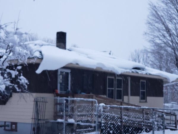 East side snow on roof.jpg