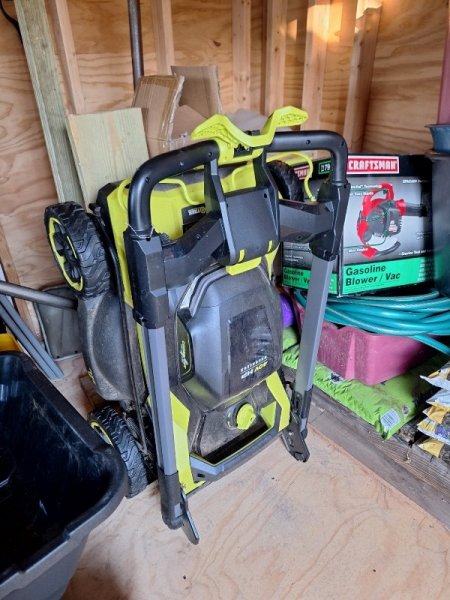 Ryobi mower folded for winter.jpg