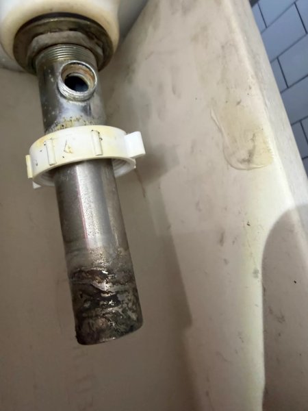 PedestalFaucetRep15-DrainPipeThatMustBeRemovedToInstallThePopUpDrain.jpg
