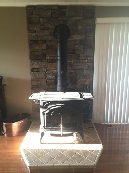 New stone wall behind stove | Firewood Hoarders Club