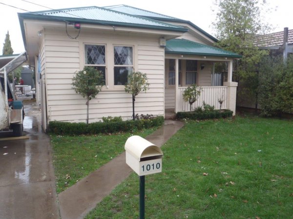 D CRick Hiuse duru=ing cladding aug 13.jpg