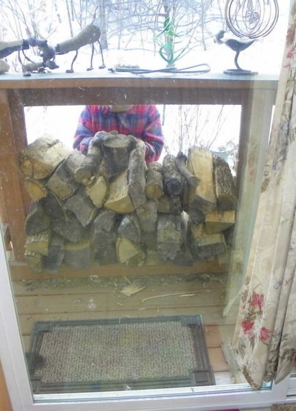 Judy filling wood rack-2.JPG