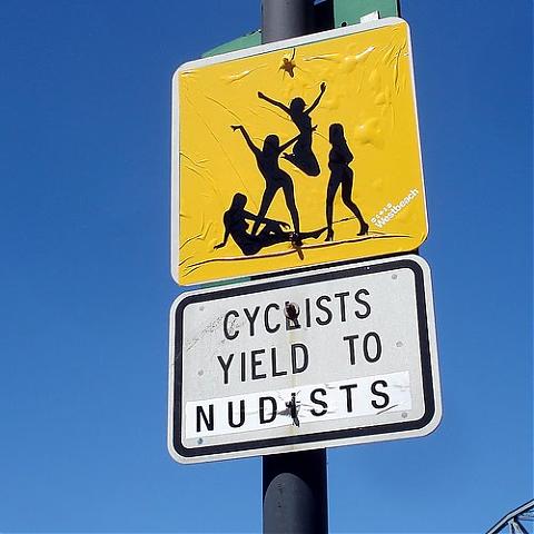 Cyclists yield to nudists.jpg